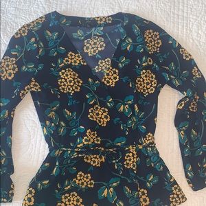 Flattering peplum top in rich blues and yellows